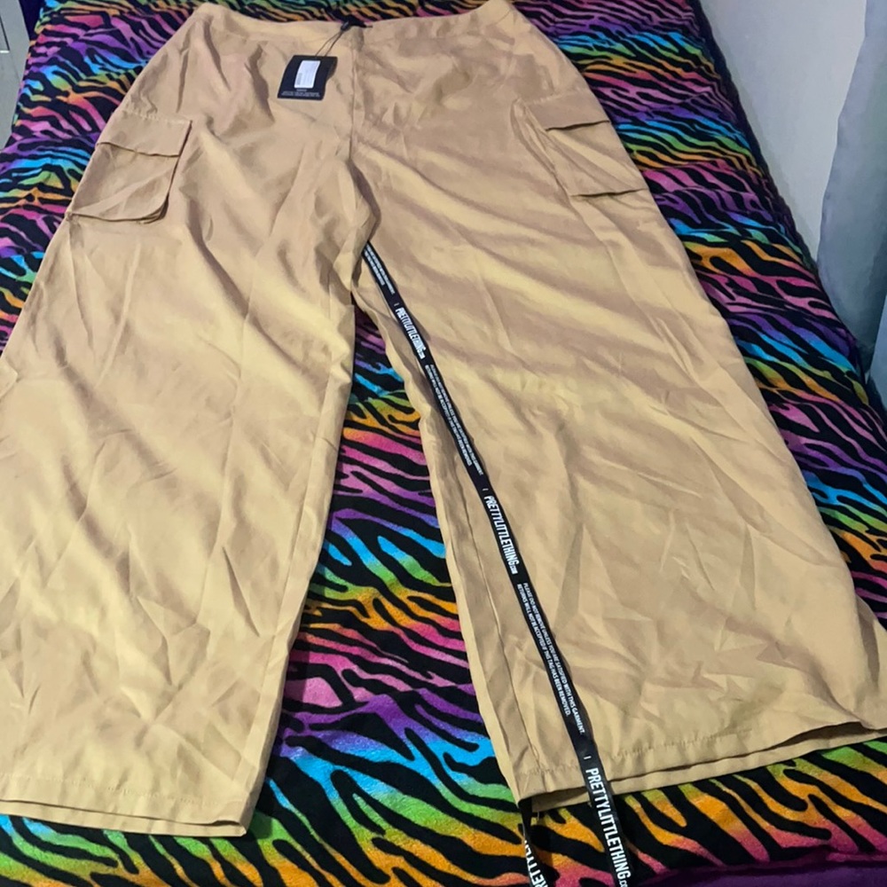 Brand new khaki cargo pants with silk material